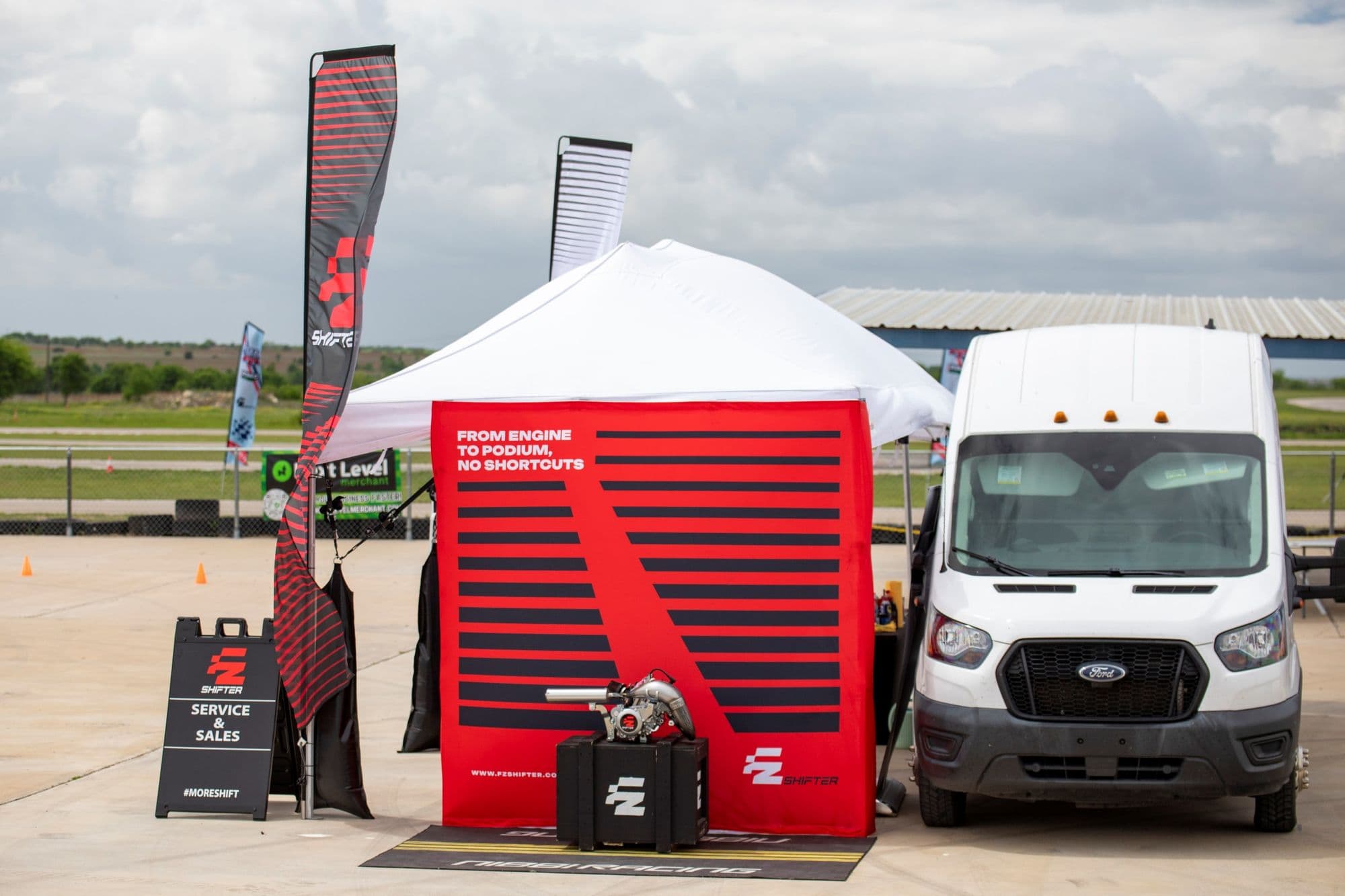 The FZ Shifter tent and support van in the KartMoto paddock.